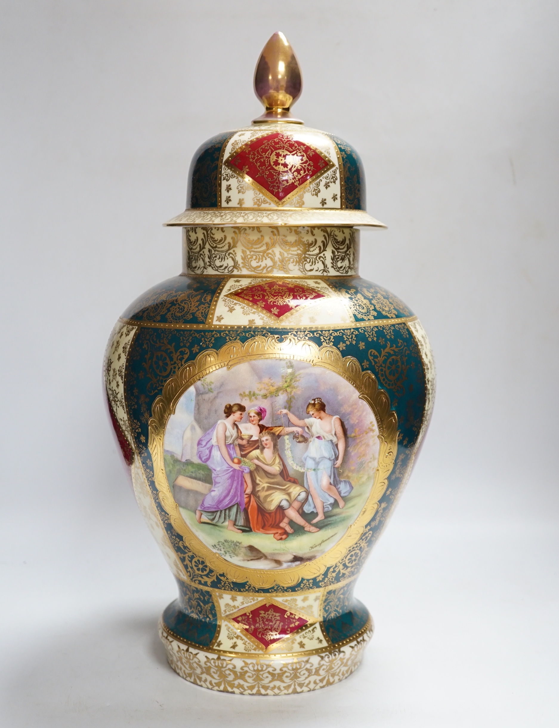 A Vienna style porcelain vase and cover, 43cm